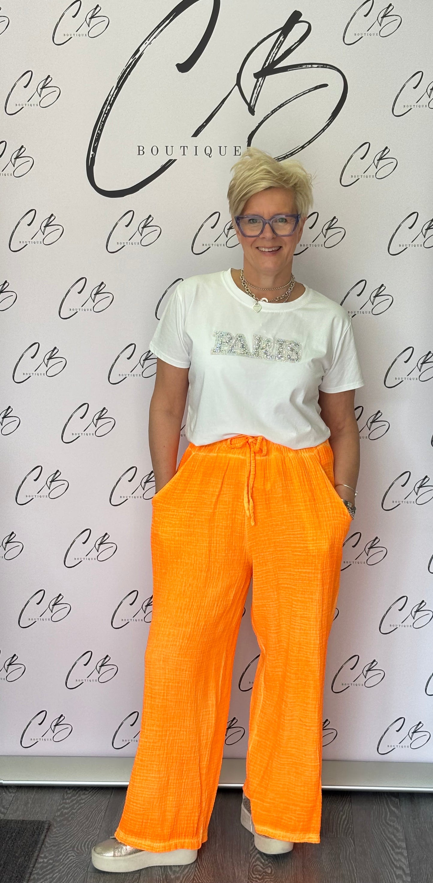 Neon orange wide leg trousers