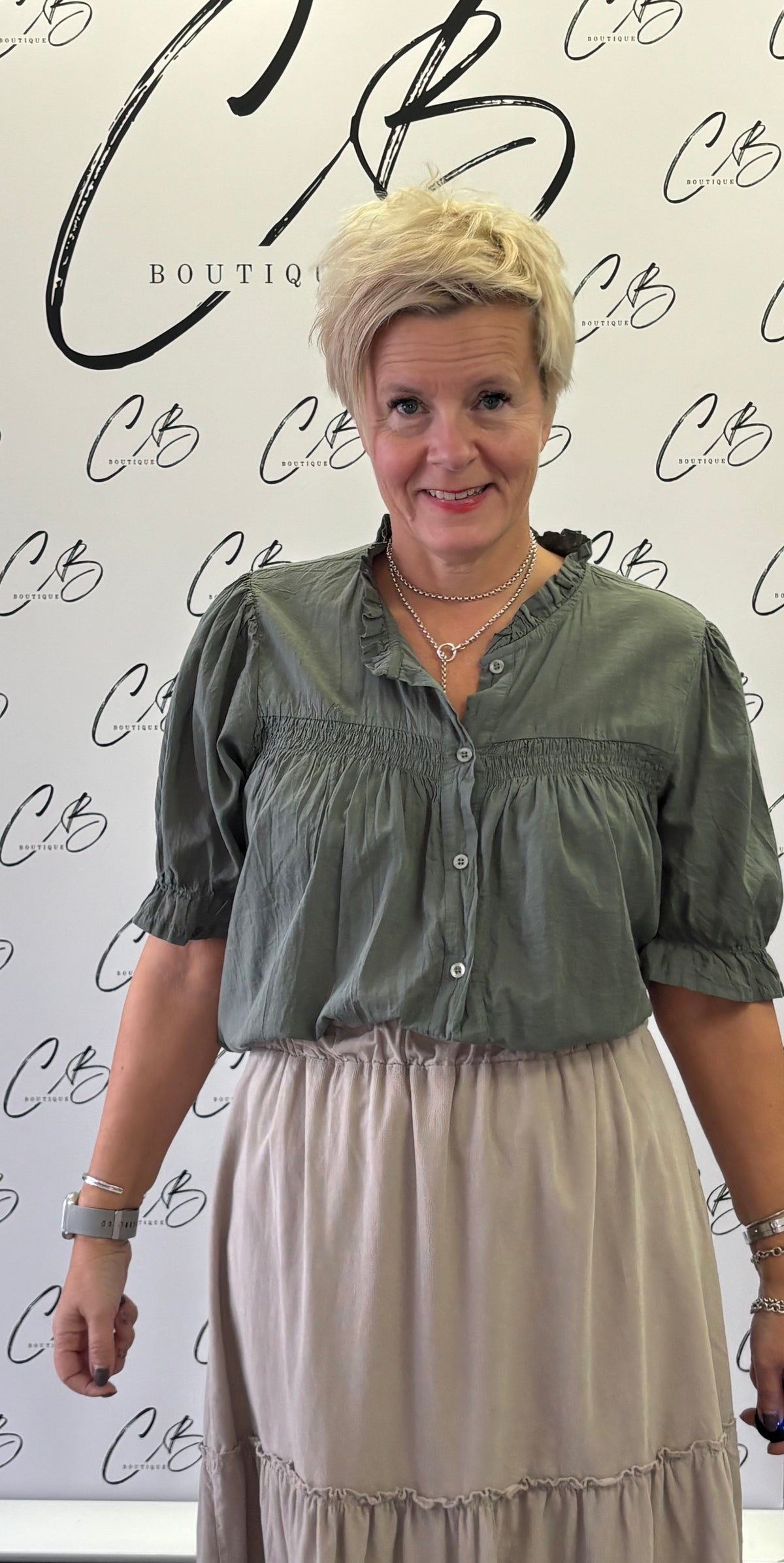Khaki cotton gypsy blouse with round neckline and ruffled sleeves