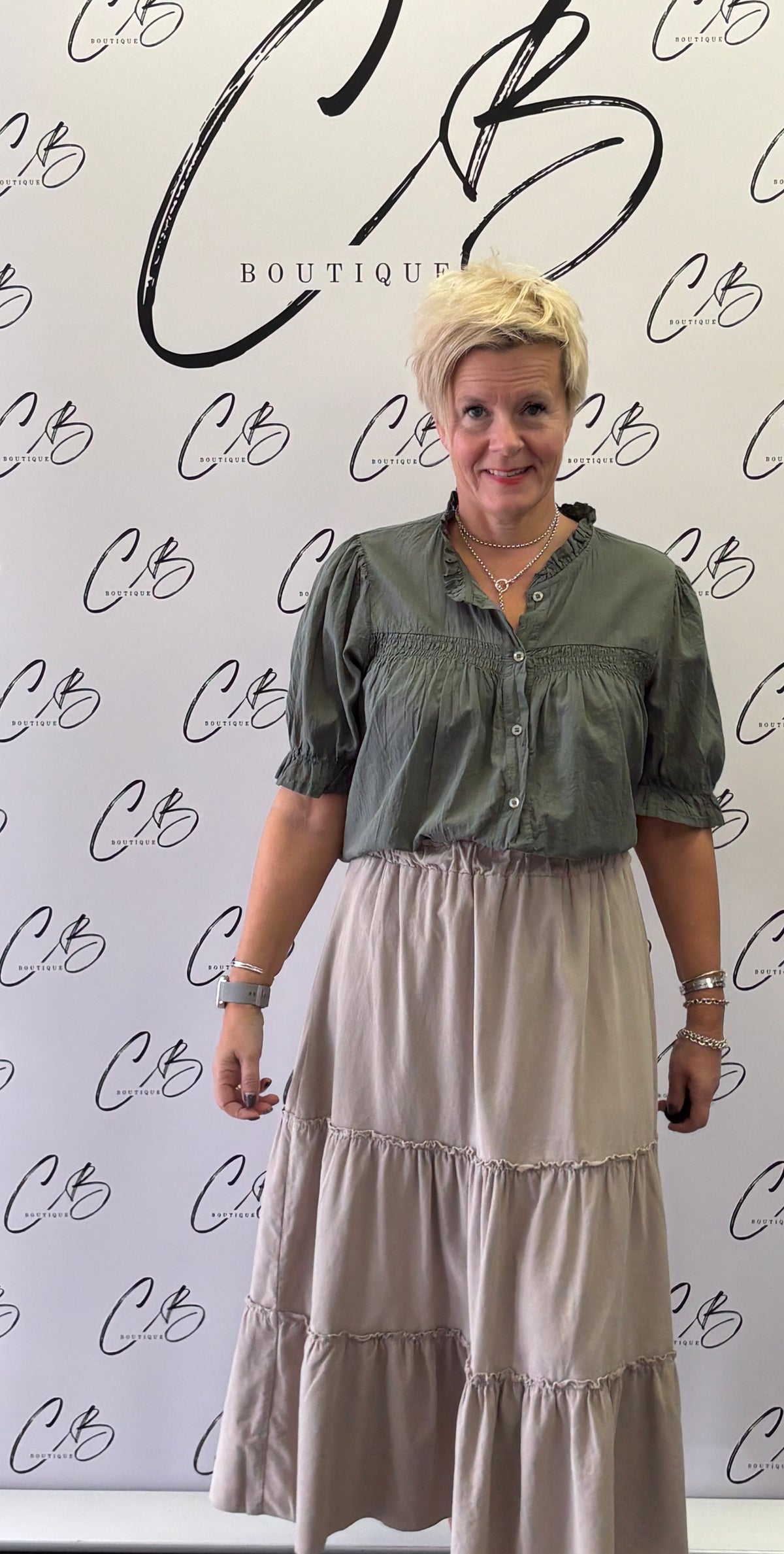 Khaki cotton gypsy blouse with round neckline and ruffled sleeves