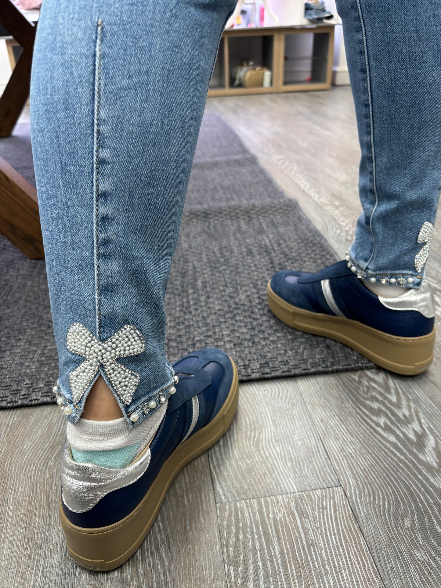 Blue denim jeans with sparkle bow