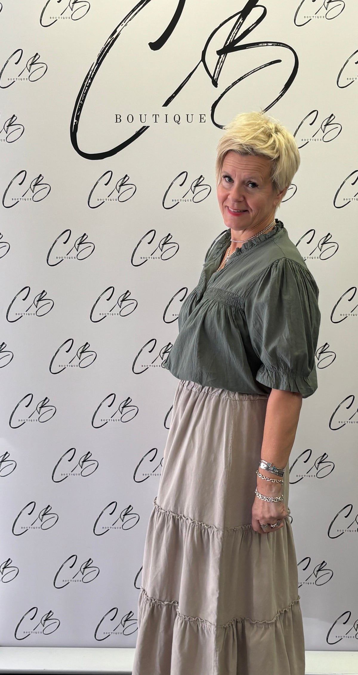 Khaki cotton gypsy blouse with round neckline and ruffled sleeves