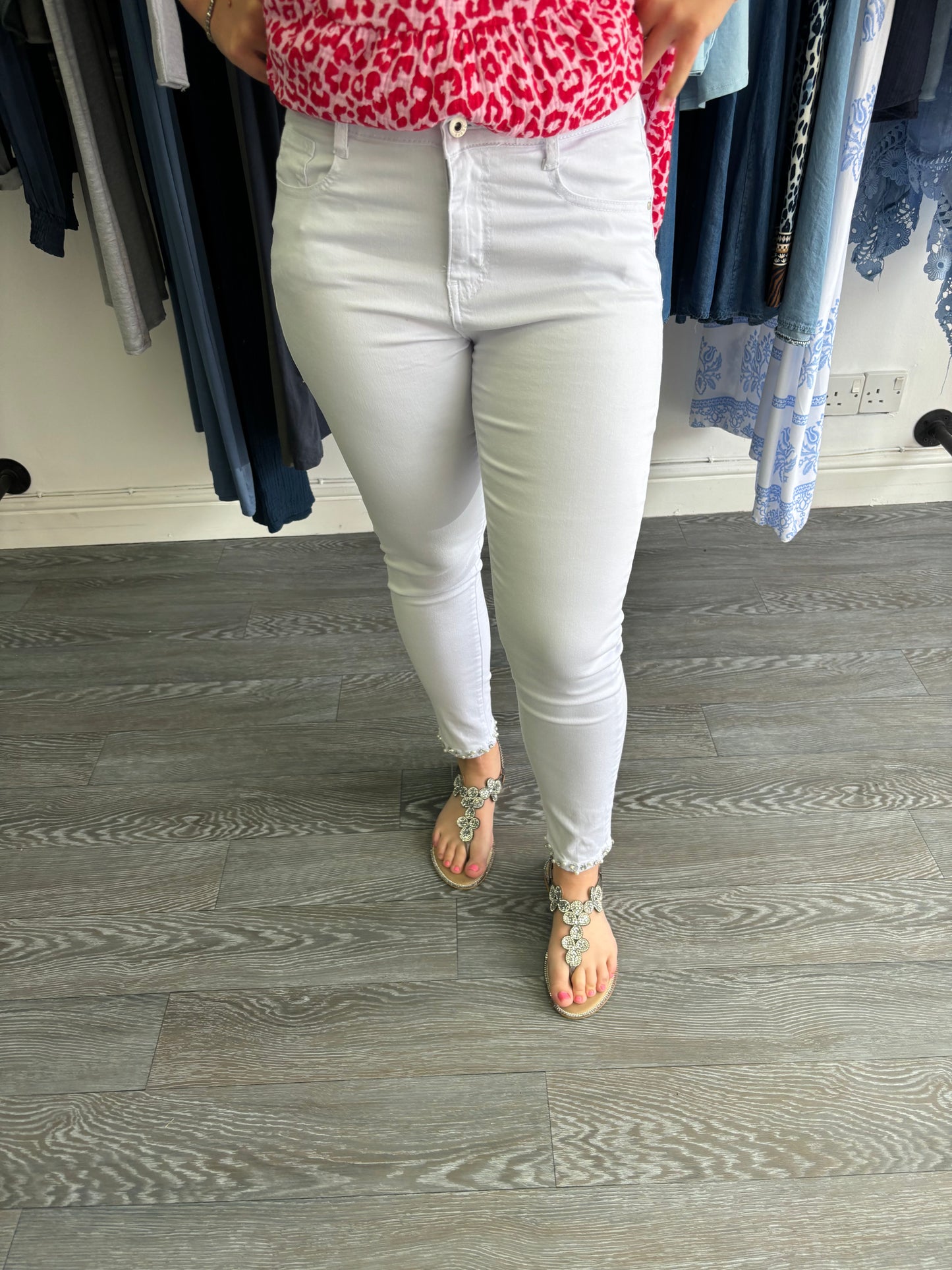 White denim jeans with sparkle bow