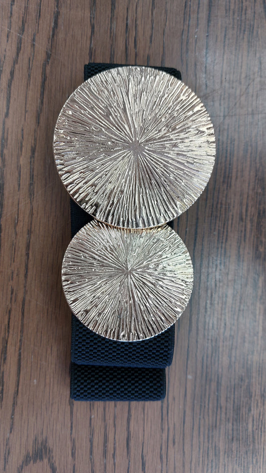 Black belt with round gold buckle