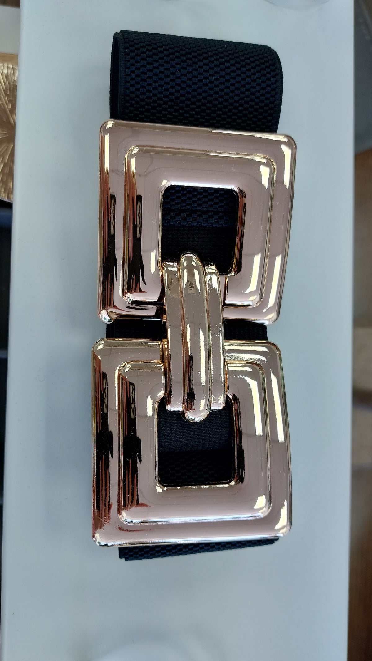 Black belt with square clasp gold buckle